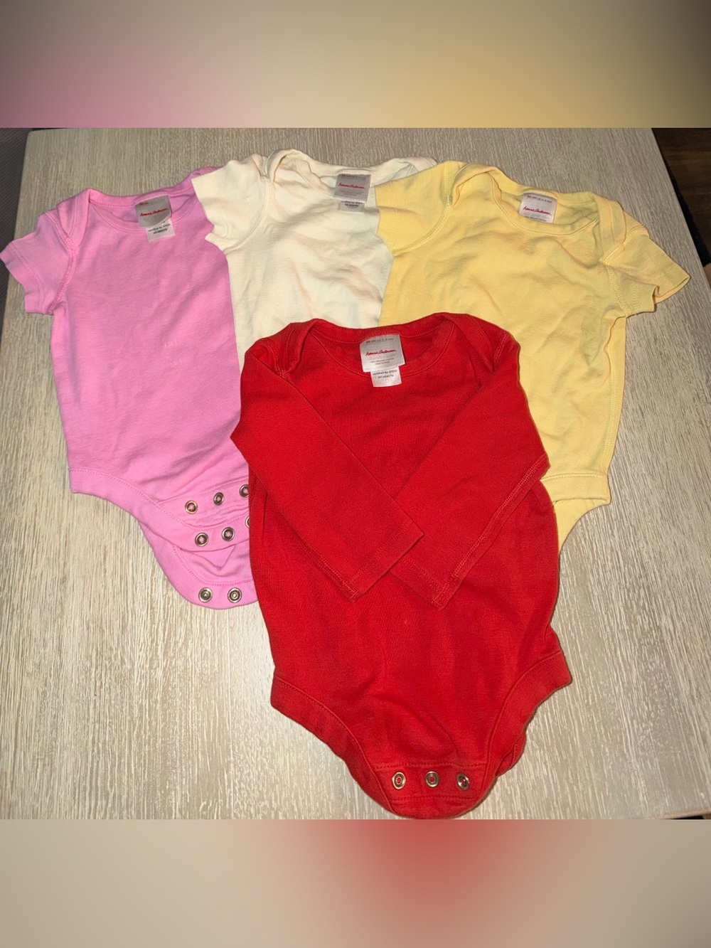 Hanna Andersson Onesie bundle of 4 - Pink, Yellow, Cream, Tomato Red